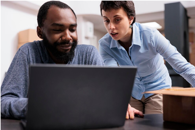 A Man and a Woman working on a Notebook PC